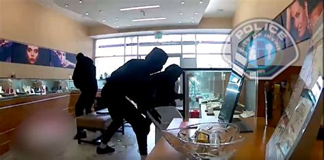 Video shows 3 masked robbers smash display cases in Irvine jewelry store